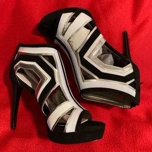 Carlos Santana black, white and silver heels